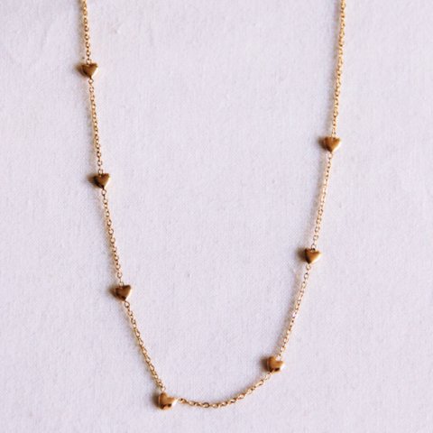 Delicate necklace with hearts - gold