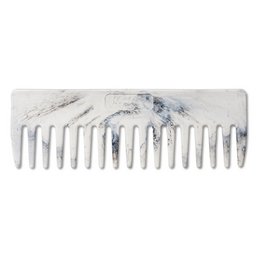 Comb made from 100% recycled fishing nets in black, blue, pink, and green colors.