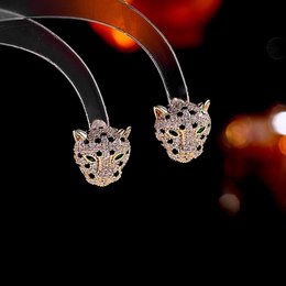 Regal Jeweled Leopard Head Stud Earrings
