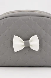 Trousse de toilette matelassée pour bébé avec nœud, rose