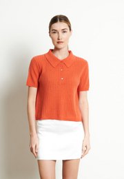  Mandarin orange cropped polo top made of traditional cashmere knit.