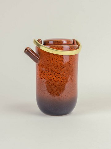 Laterite teapot by Hoa Bien with raw brass handle