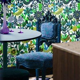  Vibrant floral botanical wallpaper with a variety of colors, patterns, and textures. Suitable for decorating living rooms, bedrooms, or other spaces.