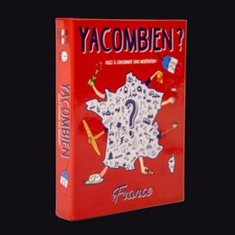  A red and white board game box titled "Yacombien - The fun quiz on France" with a question mark symbol and illustrations of French landmarks and icons.