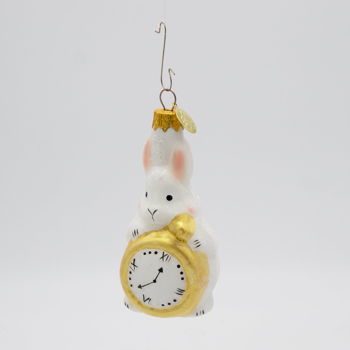 Conejito con decoración de árbol de reloj mágico