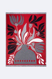 "Soft, cozy blue and green throw blanket with abstract floral and geometric patterns."