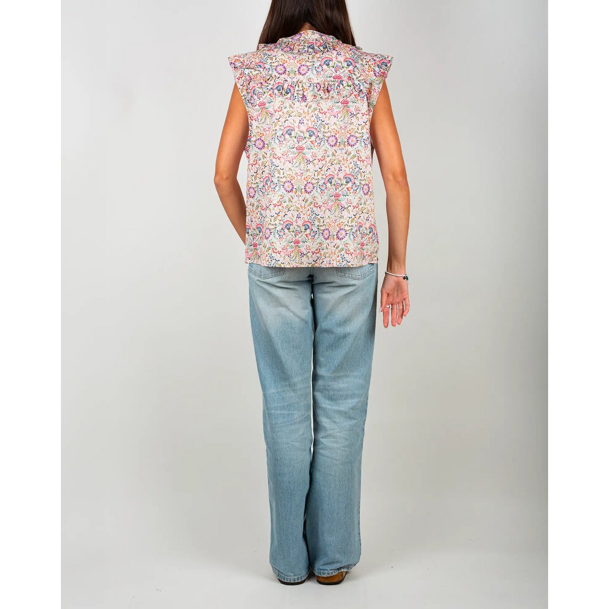 La blouse femme sans manches à volants Febre rose