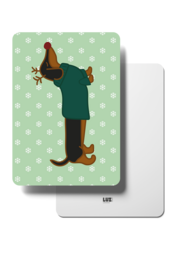  A Christmas card featuring a character with antlers in a green and white polka dot background.
