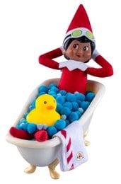 Elf doll spa set with bathtub, colorful bath balls, yellow duck, red and white striped towel, green goggles accessories.