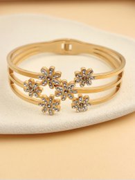 Bracelet jonc doré en acier inoxydable avec fleurs strassées