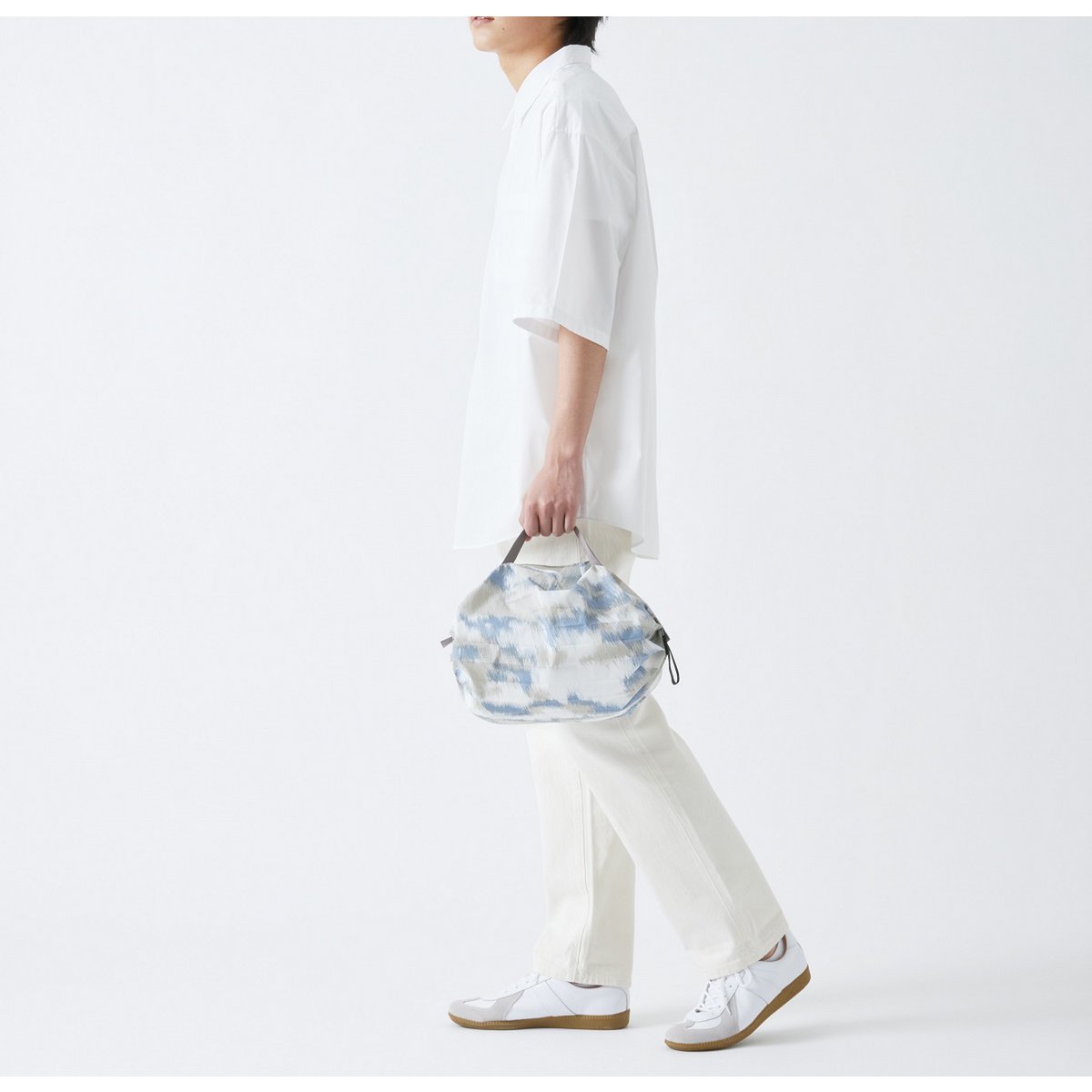 Shupatto compact foldable shopping bag size S - Floating Clouds