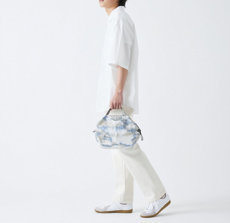 Shupatto compact foldable shopping bag size S - Floating Clouds
