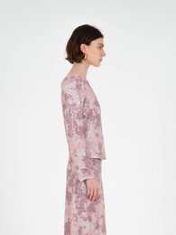 Top met sterrenprint en pailletten