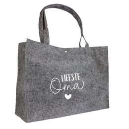 A grey felt tote bag with the text "Dearest Grandma" printed in white. The bag has two handles and a simple, minimalist design.