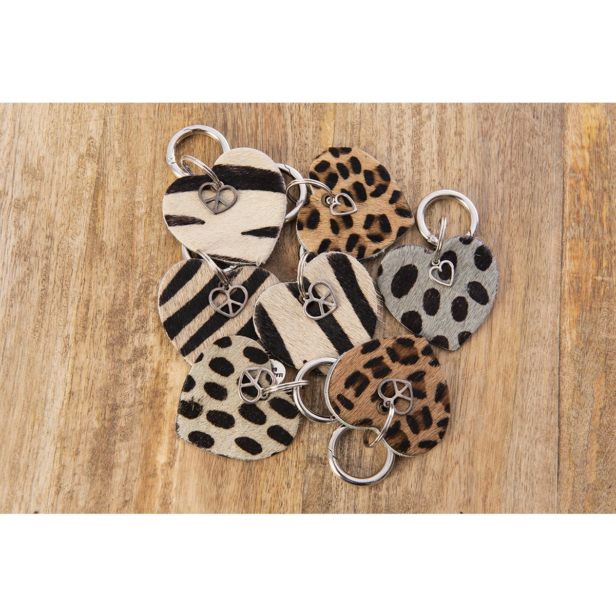 Taskeophæng hjertedyr med leopard charm