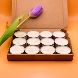 'Set of 6, 8, or 12 natural eco soy wax scented tea lights in various scents like Lime Basil & Mandarin, English Pear & Freesia, Peony Blush & Suede, Jasmine, and Lavender. Ideal for home decor and as a gift.'