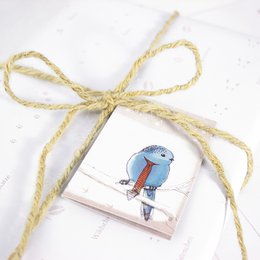 Gift tag bird in the snow