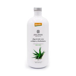 Organic and biodynamic aloe vera juice in a clear glass bottle with a white label. The product is certified by Demeter, indicating it is produced using biodynamic farming methods.