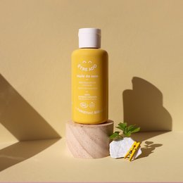 Cosmos Organic Care Oil is a 100% natural, moisturizing, antibacterial, and sebum-regulating organic cream. The product features a vibrant yellow color and a cylindrical bottle shape.