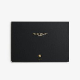  Black productivity planner with gold text, includes daily desk pad for time tracking and goal setting.