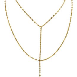 A delicate gold-toned necklace with a Y-shaped design, featuring a pendant that hangs from the center. The necklace appears to be made of a chain with small beads or charms along its length, creating a subtle and elegant look.