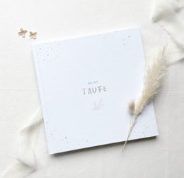 A white square photo album with the text "Baptism" printed on the cover. The album appears to be made of high-quality materials and is suitable for storing and displaying baptism photos.