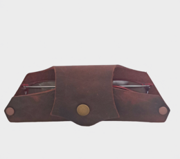 Handmade triangle wallet in analine leather with a fox design.