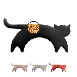 Soft, plush neck pillow filled with organic wheat grains in a variety of colors including black, red polka dot, pink, gray, purple, red, and dark brown. Shaped like a playful cat.