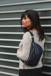 Midnight blue fanny pack with a sleek, modern design. Made of durable materials for everyday use.