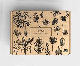 A rectangular gift box with a floral pattern printed on the cardboard surface. The box appears to be made of brown kraft paper or cardboard material.