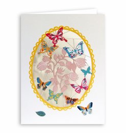 Laser-cut card featuring a colorful display of butterflies in an oval frame with a yellow border.