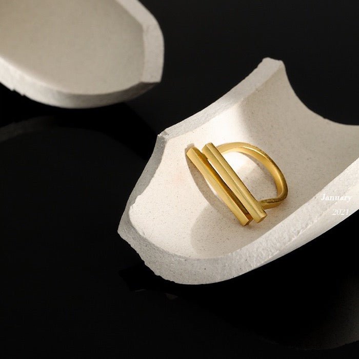 Bague double barre géométrique minimaliste audacieuse