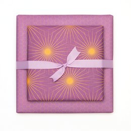 Lila Geschenkpapier mit Sonnensternen, retro Geschenkpapier orange und lila, ideal als Geburtstags- Geschenkpapier Frühling oder Weihnachtsgeschenkpapier