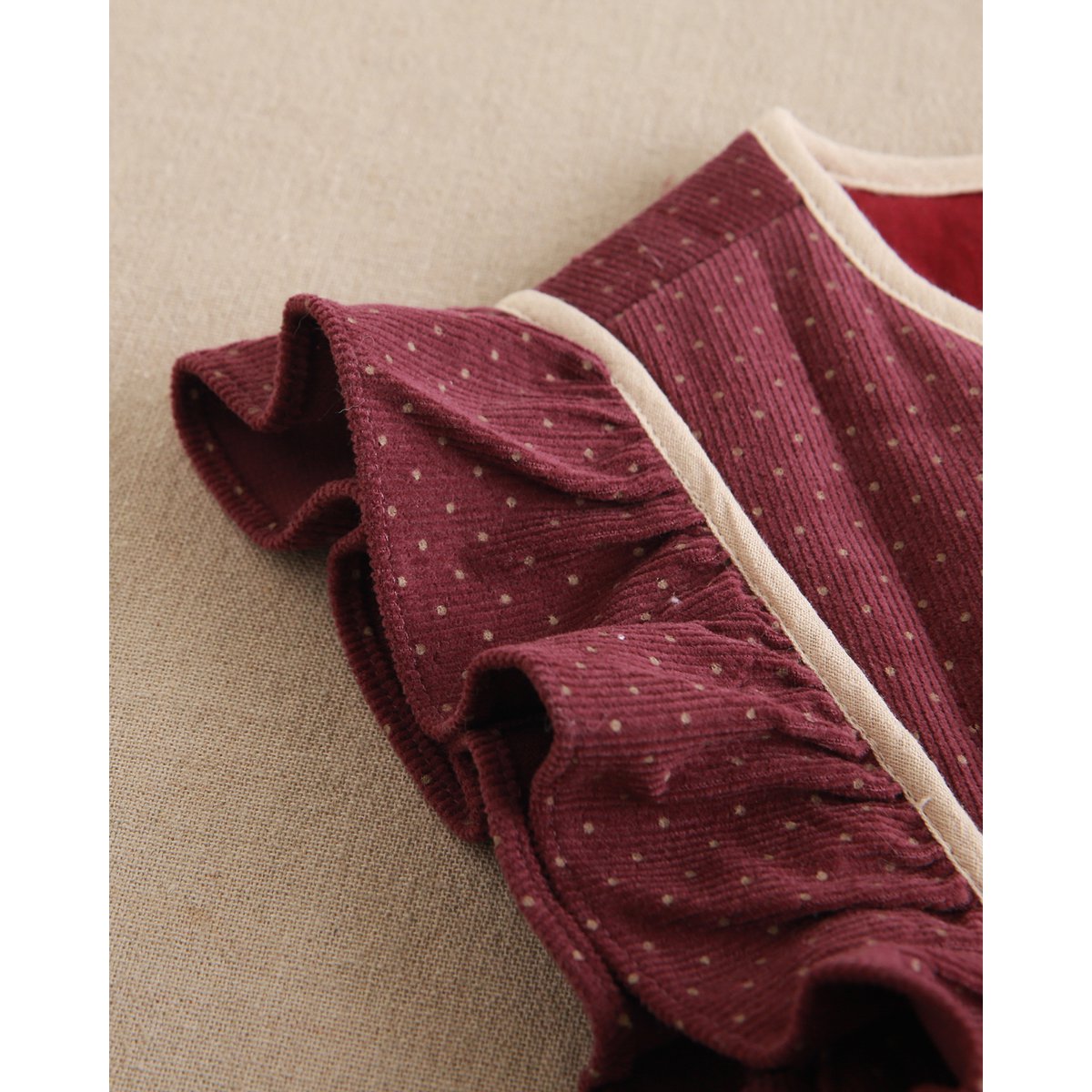 Meisjesvest met paarse ruches en beige stippen P73-11604091