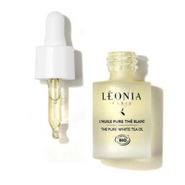 Pure white tea oil with regenerating and antioxidant properties, packaged in a glass bottle with a dropper.