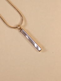 Elegant silver-toned pendant necklace with a simple, minimalist design.