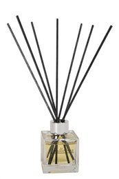 A 100ml reed diffuser with a pomegranate and white fig scent, featuring a glass container with black reeds.