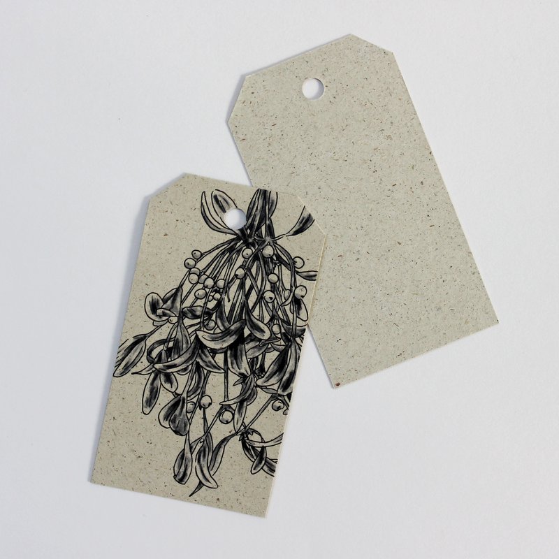 Gift tags made from grass paper, mistletoe
