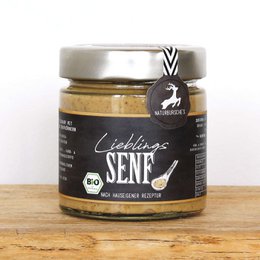  Organic mustard in a glass jar with a black and white label. The label features the text "Lieblings SENF" which means "Favorite Mustard" in German.