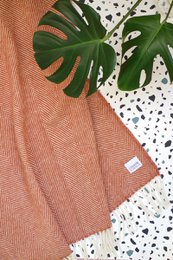 Coperta in lana / coperta coccolosa a spina di pesce in terracotta