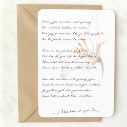 A condolence card with a handwritten message and a delicate floral illustration. The card expresses sympathy and offers comfort during a time of loss.