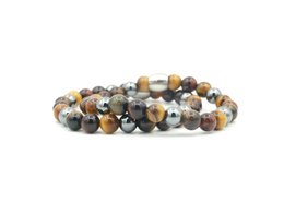 A set of two bracelets made of brown and multicolored beads, featuring the text "MR. & MR." on the packaging.