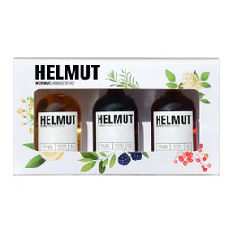 A tasting box containing 3 mini bottles of Helmut vermouth, a premium vermouth brand. The box features the Helmut logo and branding, along with illustrations of botanicals and herbs, indicating the natural ingredients used in the vermouth.