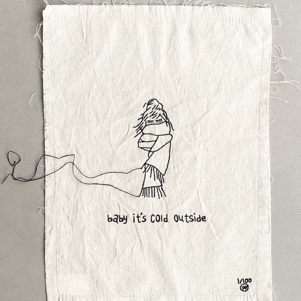 stitched art 'baby it's cold'