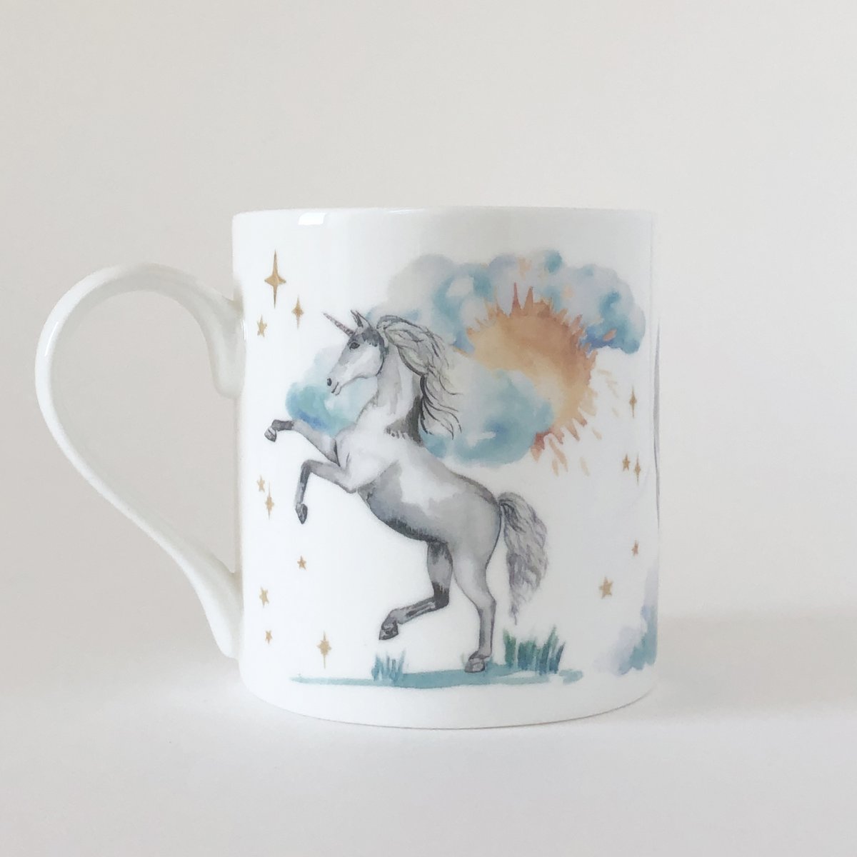 Aquarel eenhoorns en regenbogen mok