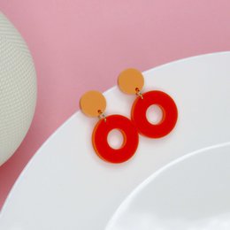 Dobbelt cirkel ørestikker i fersken og orange