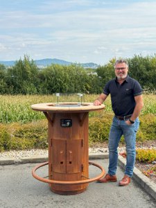 Bar table stove gas fire made of stainless steel with a Corten steel look