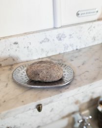 "Natural felted wool soapstone, round smooth texture, beige gray earth tones, organic fairtrade body care"