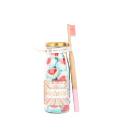 Bouteilles de bonbons avec brosse à dents