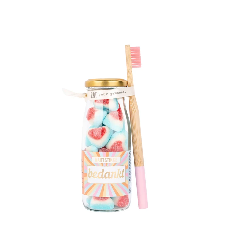 Bouteilles de bonbons avec brosse à dents